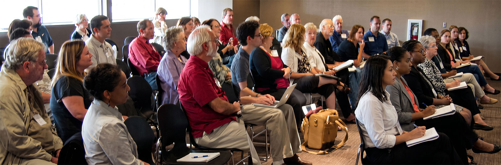 Audience seated at a writing workshop